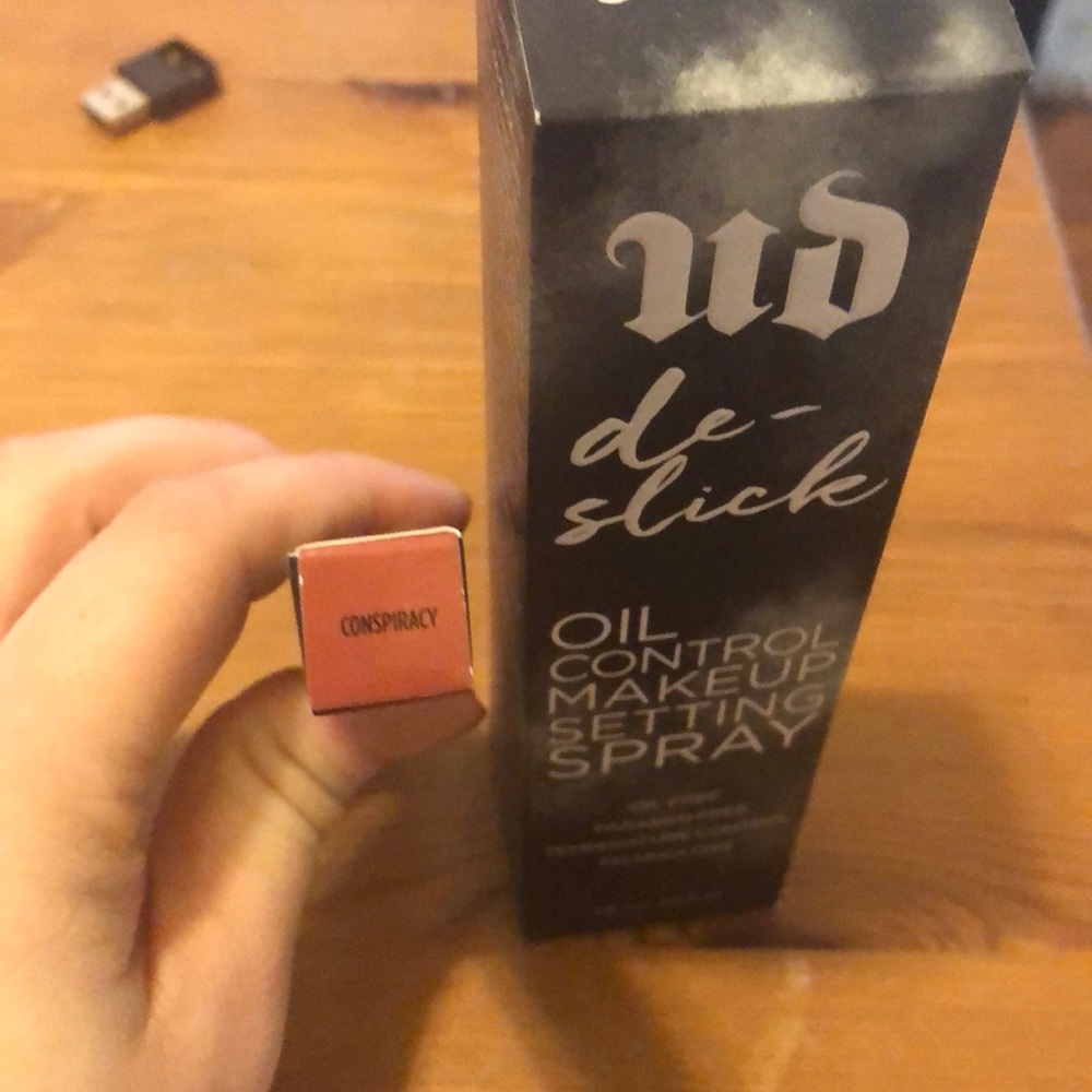 Bundle of conspiracy lip liner and setting spray